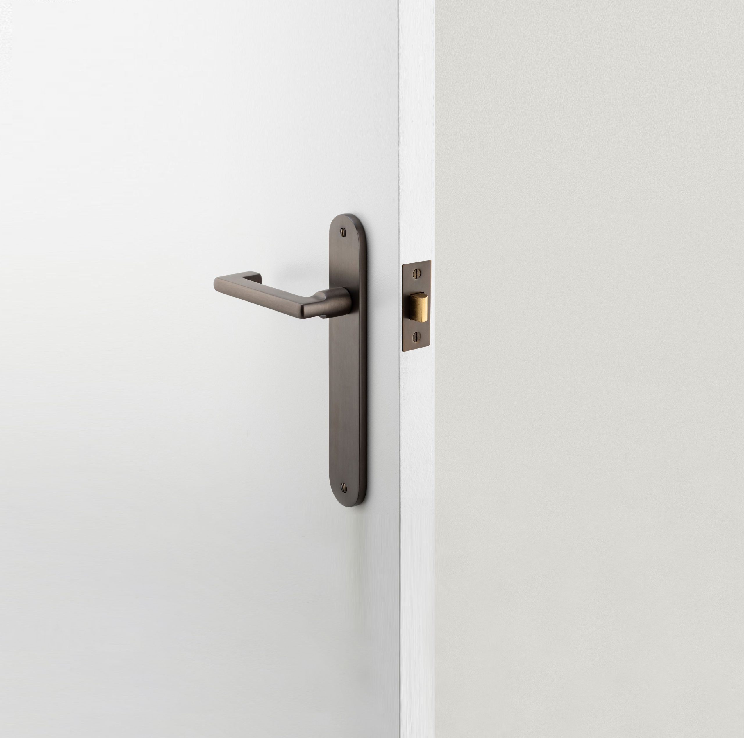 14852P85 - Baltimore Return Lever - Oval Backplate - Satin Nickel - Privacy