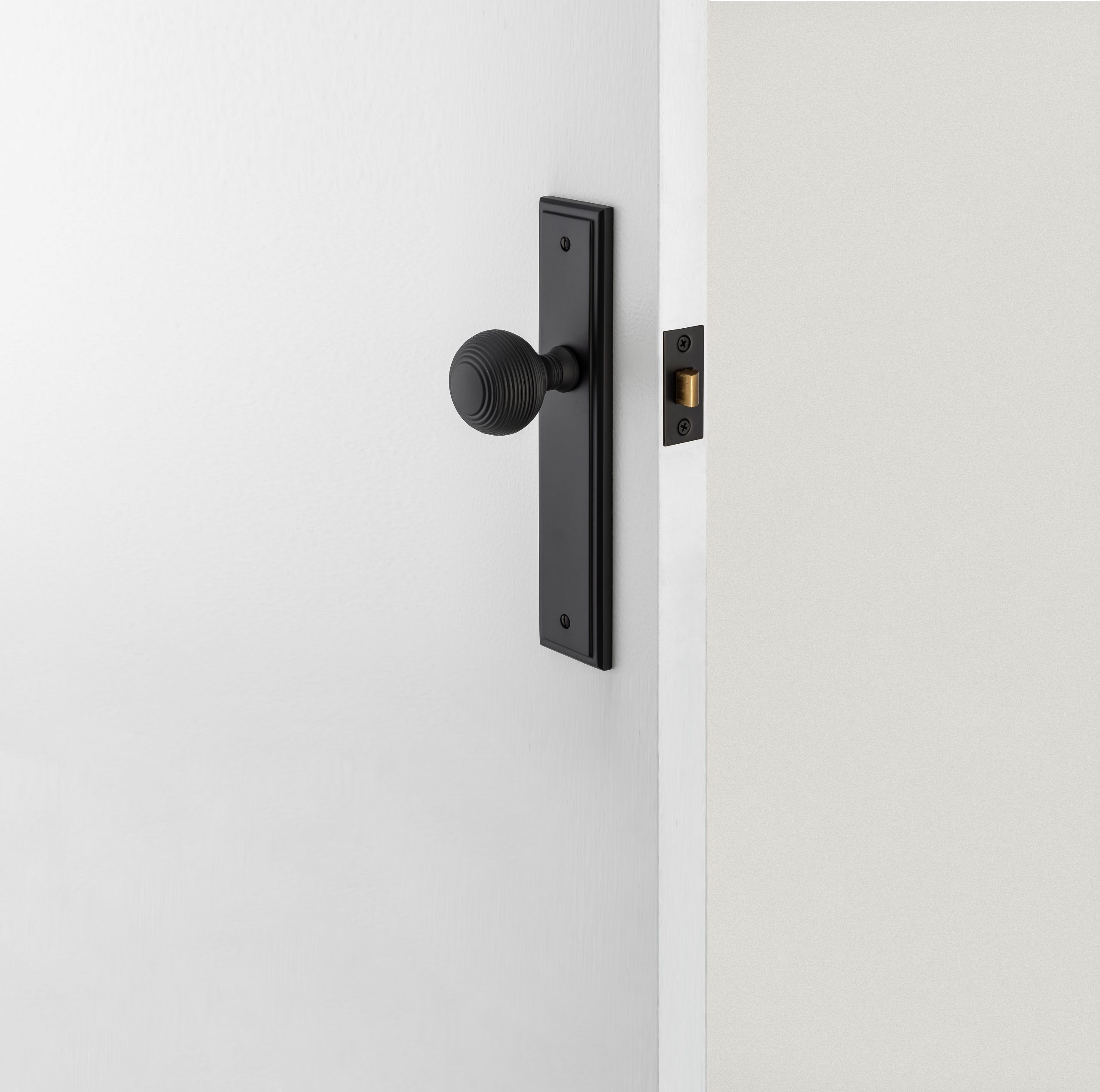 10842P85 - Guildford Knob - Stepped Backplate - Signature Brass - Privacy