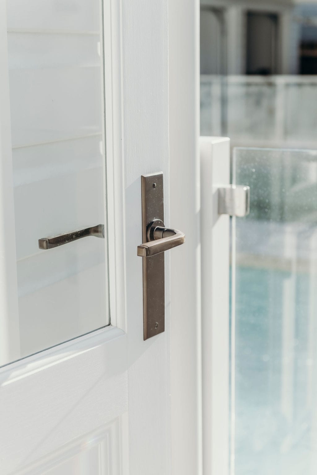 The Annecy Lever in Signature Brass is showcased on this back door.